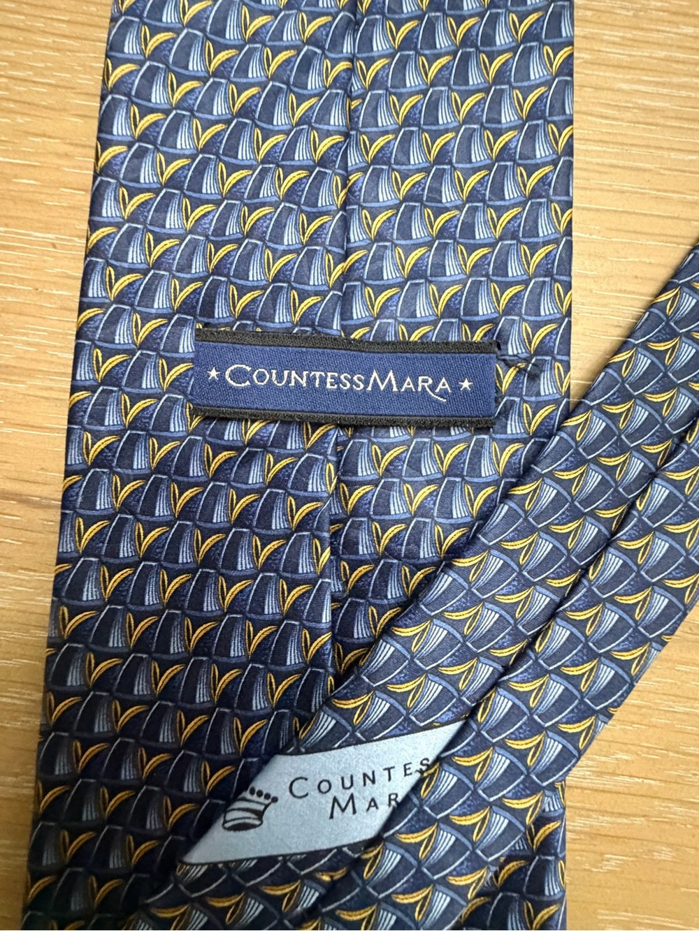 Classic Blue Patterned Silk Tie with Subtle Gold Motif - Picture 6 of 6